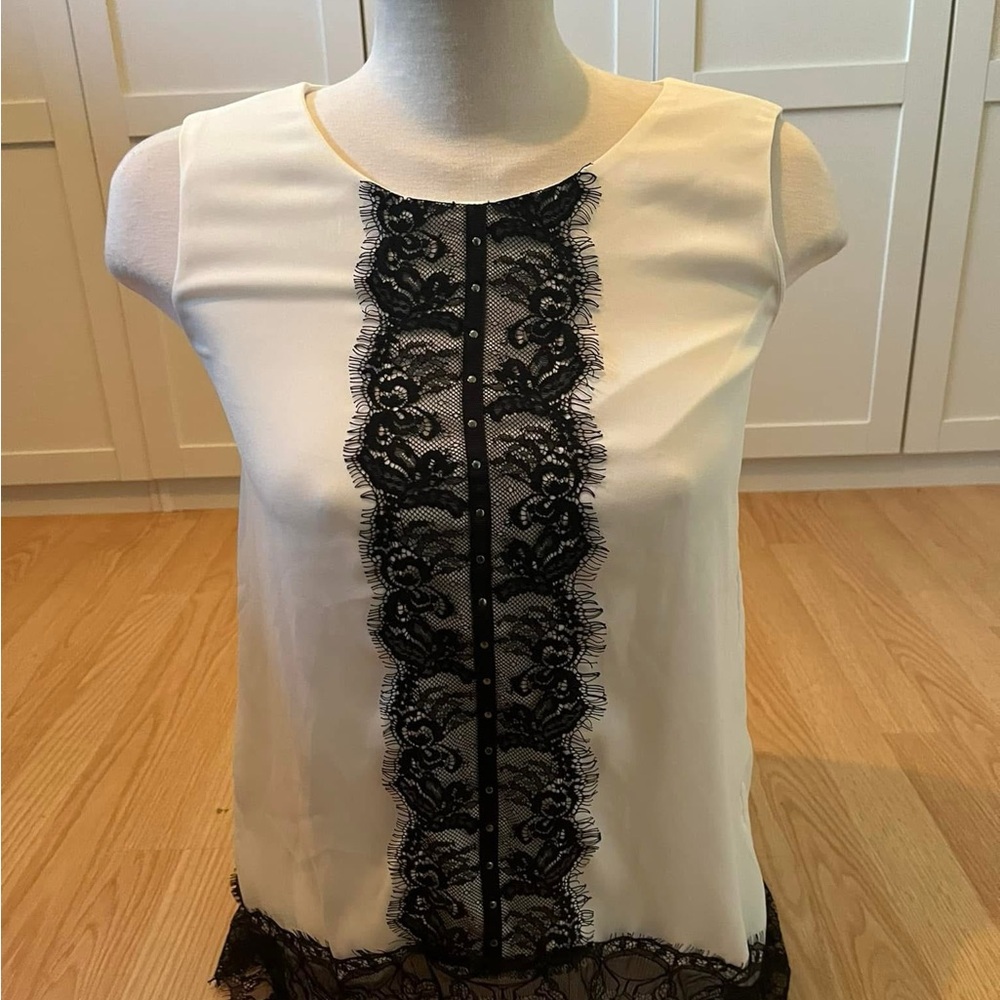 Elegant White Sleeveless Top with Black Lace Detail